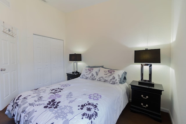 bedroom with a closet and visible vents