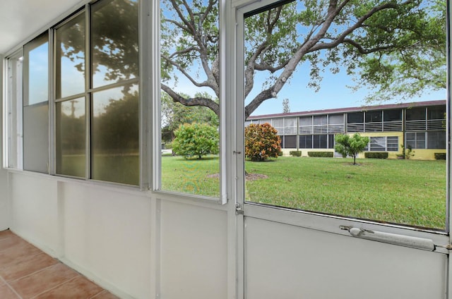 unfurnished sunroom featuring a healthy amount of sunlight