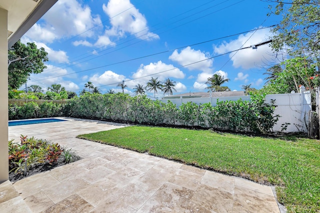 view of patio featuring a fenced backyard and a fenced in pool