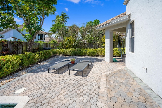 view of patio / terrace with fence