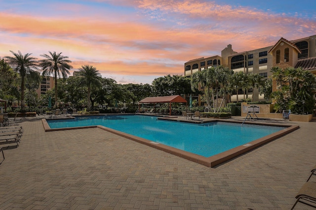 pool with a patio