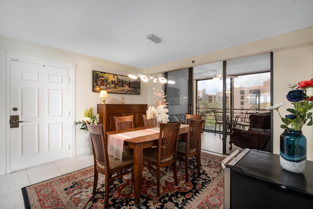 dining space with tile patterned floors