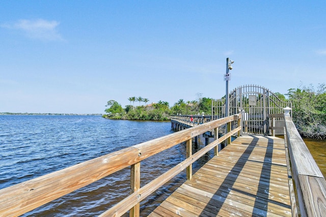 view of dock with a water view