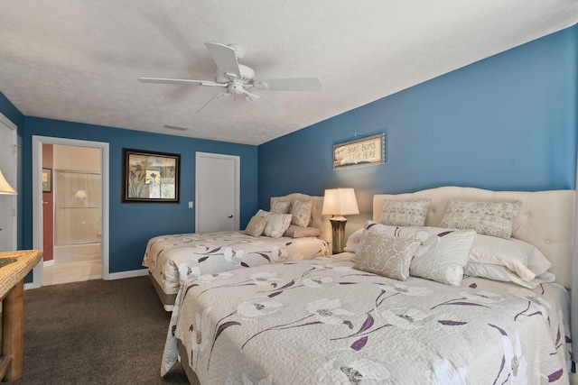 bedroom with baseboards, visible vents, carpet floors, ceiling fan, and a textured ceiling