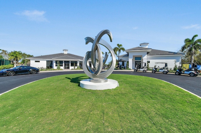 exterior space featuring a front lawn