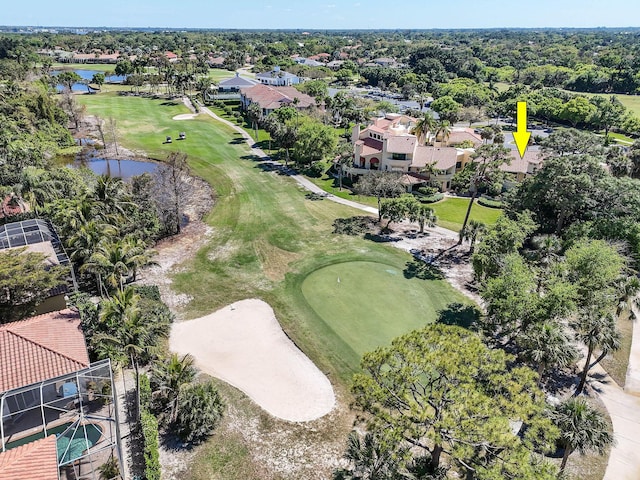 bird's eye view featuring a water view and golf course view