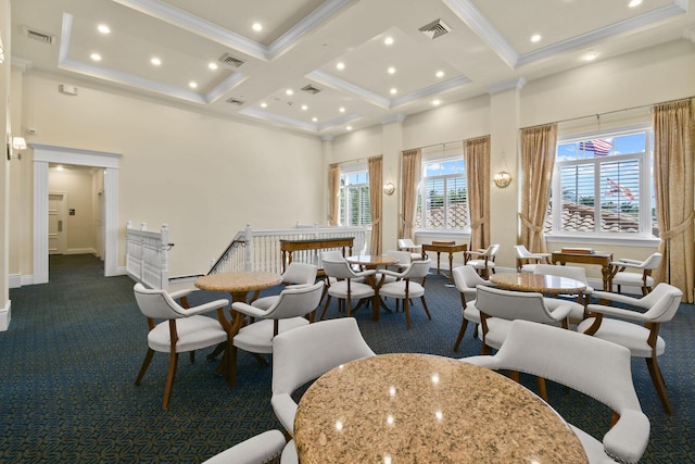 interior space featuring a towering ceiling, coffered ceiling, visible vents, and dark colored carpet