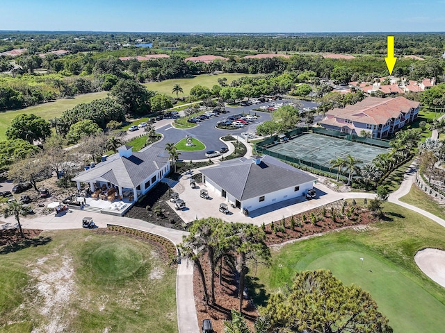 birds eye view of property with golf course view