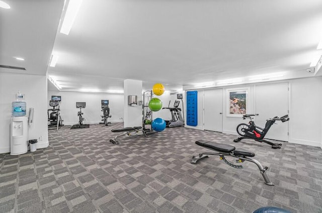 exercise room featuring carpet floors