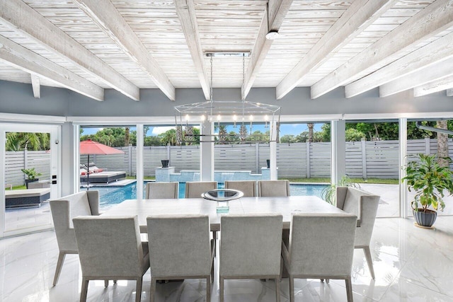 sunroom featuring a chandelier, wood ceiling, and beamed ceiling