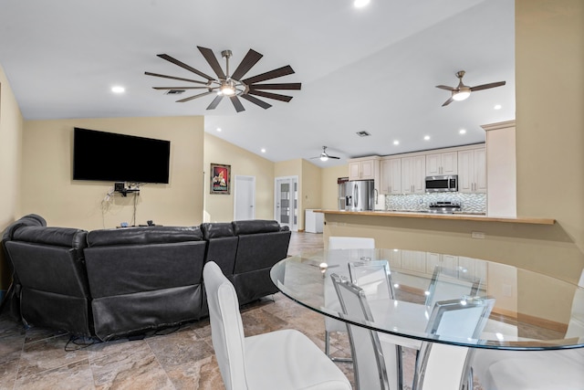 dining room with vaulted ceiling, a ceiling fan, and recessed lighting