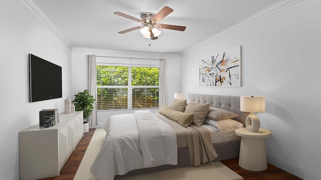 bedroom featuring baseboards, ceiling fan, ornamental molding, and wood finished floors