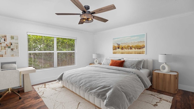 bedroom featuring crown molding and wood finished floors