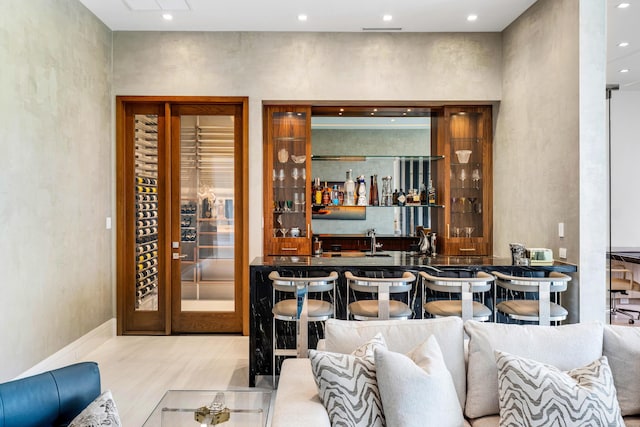 bar with recessed lighting and wet bar