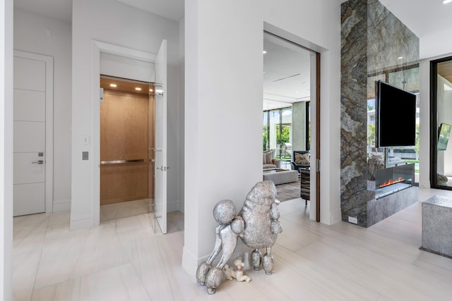 hallway with expansive windows