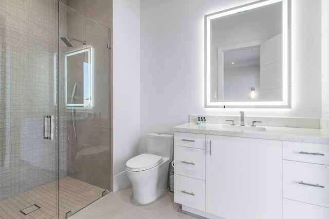 full bathroom with a shower stall, toilet, and vanity