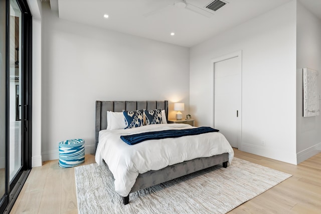 bedroom with recessed lighting, a ceiling fan, baseboards, visible vents, and light wood-style floors