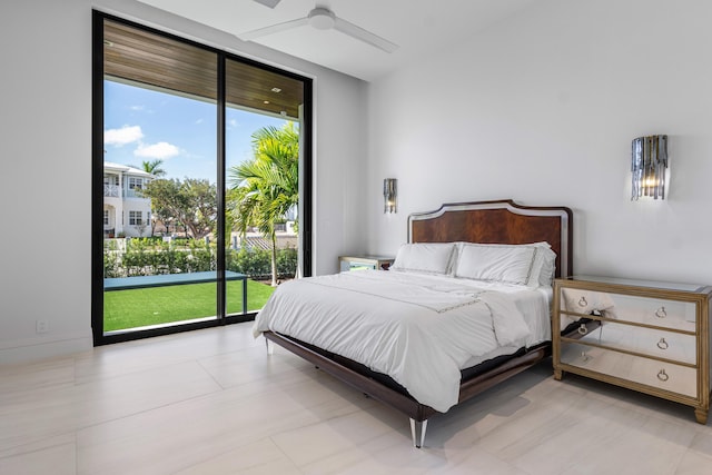 bedroom featuring multiple windows, a ceiling fan, and access to exterior