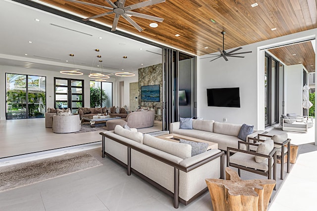 living area featuring ceiling fan, light tile patterned floors, wooden ceiling, and recessed lighting