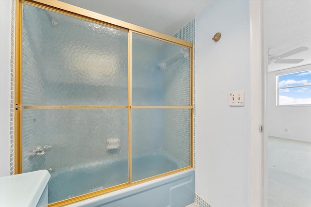 full bathroom with shower / bath combination with glass door and a ceiling fan