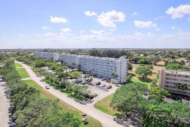 birds eye view of property featuring a city view