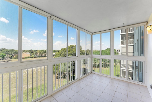 unfurnished sunroom featuring plenty of natural light