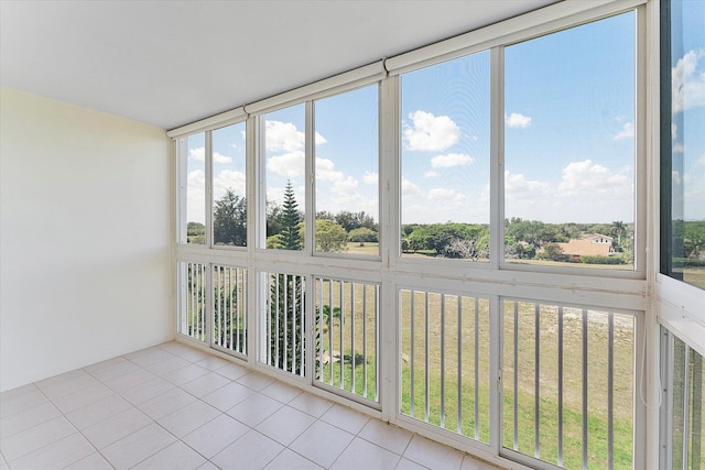 unfurnished sunroom with plenty of natural light