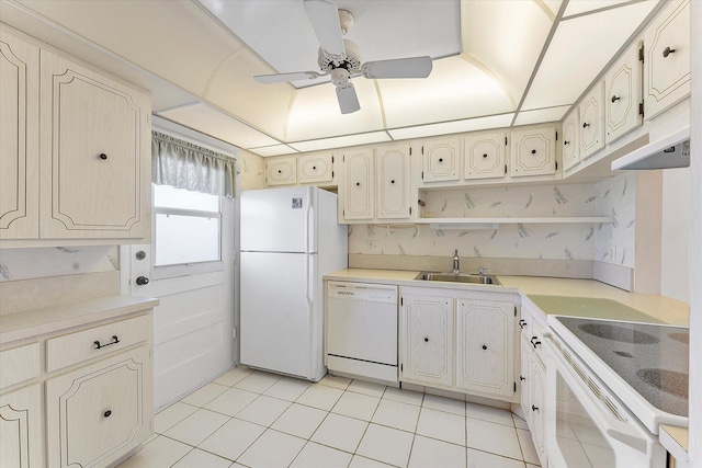 kitchen featuring white appliances, a ceiling fan, light countertops, open shelves, and a sink