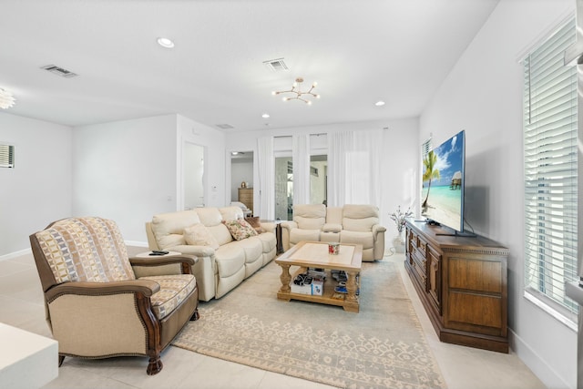 living room with light tile patterned flooring, visible vents, and recessed lighting