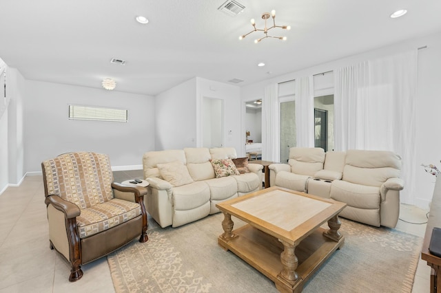 living room featuring a notable chandelier, visible vents, and recessed lighting