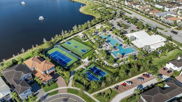 bird's eye view featuring a water view and a residential view