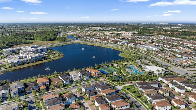 bird's eye view featuring a water view and a residential view