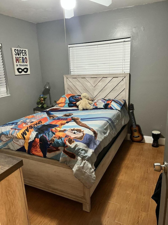 bedroom featuring wood finished floors