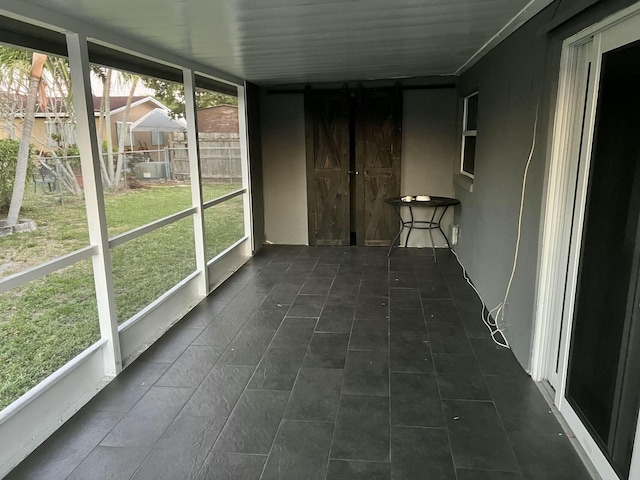 view of unfurnished sunroom