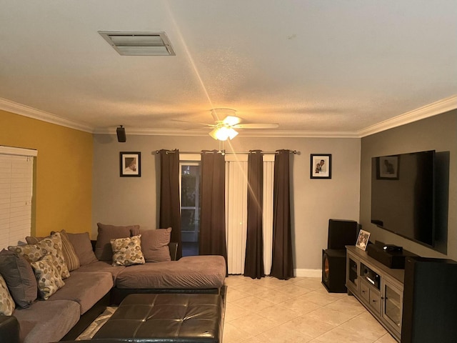 living room featuring ceiling fan, light tile patterned flooring, visible vents, baseboards, and crown molding