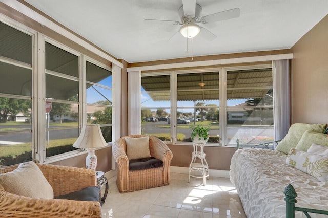 sunroom with a ceiling fan