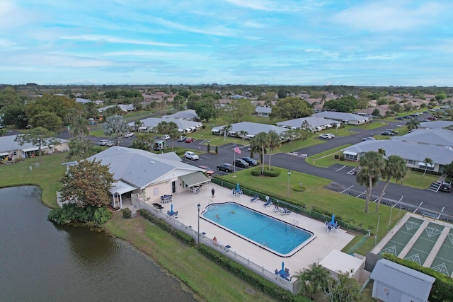 aerial view featuring a residential view and a water view