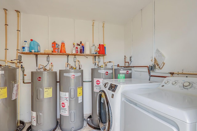 laundry area featuring laundry area, washer and clothes dryer, and electric water heater