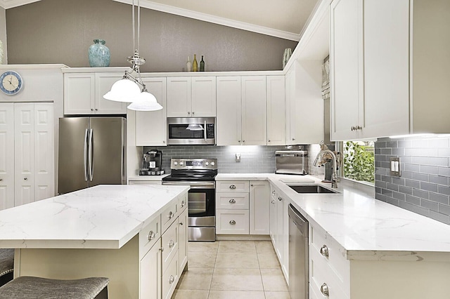 2045 NW 127th Ter, Coral Springs, FL 33071 - kitchen with ornamental molding, a sink, backsplash, and appliances with stainless steel finishes