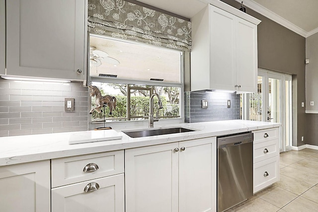 2045 NW 127th Ter, Coral Springs, FL 33071 - kitchen with ornamental molding, a sink, light stone counters, dishwasher, and white cabinets