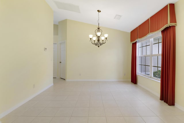 empty room with lofted ceiling, baseboards, visible vents, and a chandelier