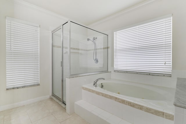 bathroom with a stall shower, baseboards, ornamental molding, tile patterned flooring, and a bath