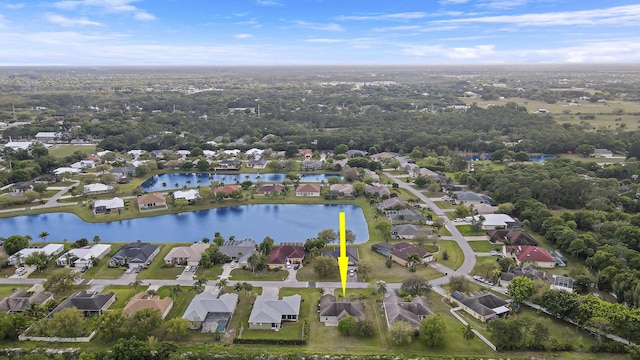 aerial view featuring a water view and a residential view