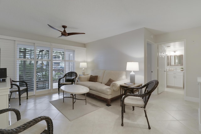 living room with light tile patterned flooring and a ceiling fan