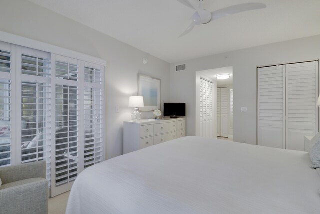 bedroom featuring visible vents, a closet, and a ceiling fan