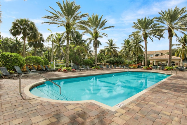 pool with a patio