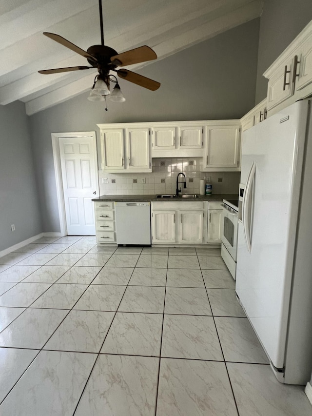 kitchen featuring dark countertops, lofted ceiling with beams, backsplash, a sink, and white appliances