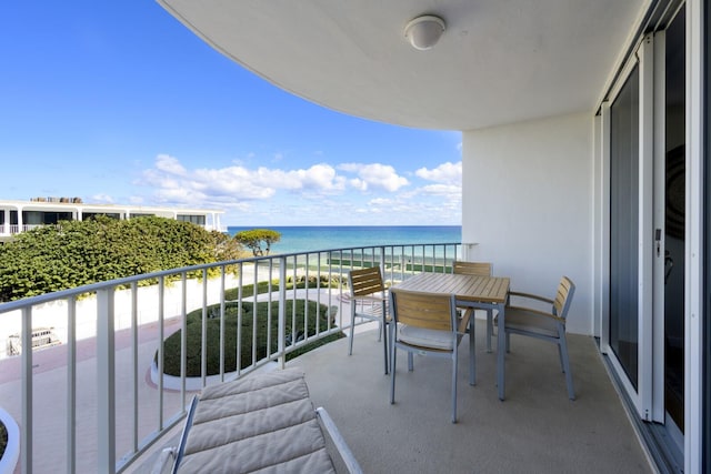 balcony featuring a water view