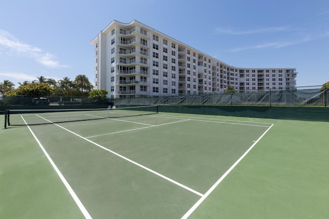 view of sport court with fence