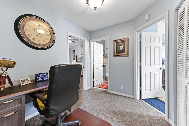 office area with carpet flooring and baseboards